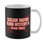 Black coffee mug with Cascade Bigfoot Blood Mystery IV Blood Trails red distressed text and bloody trail graphic