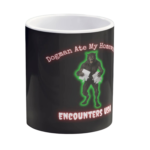 Dogman Ate My Homework funny mischievous Dogman holding torn homework design on black ceramic coffee mug - official Encounters USA merch
