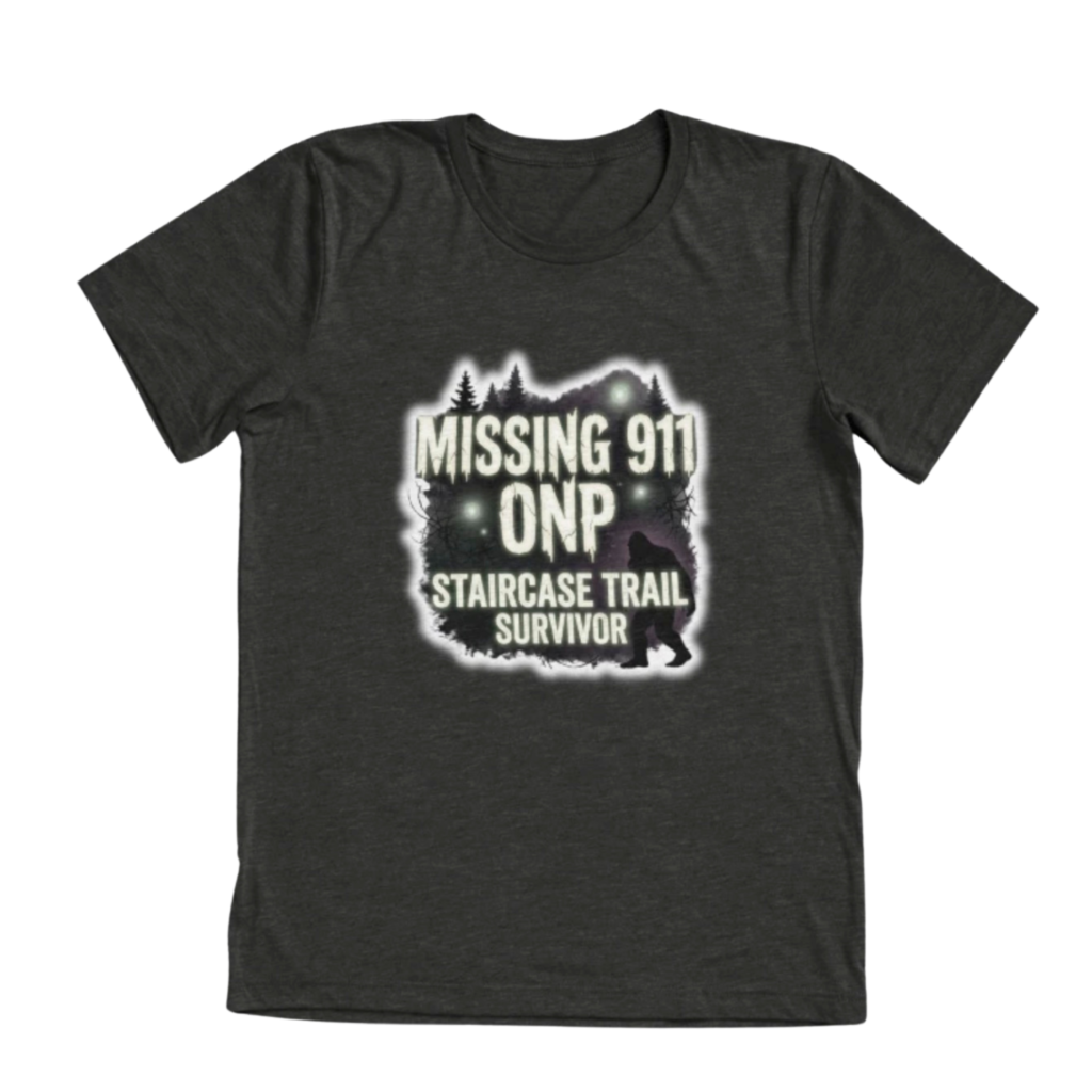 Dark gray tri-blend t-shirt with Missing 911 ONP Staircase Trail Survivor design featuring glowing forest and Bigfoot silhouette