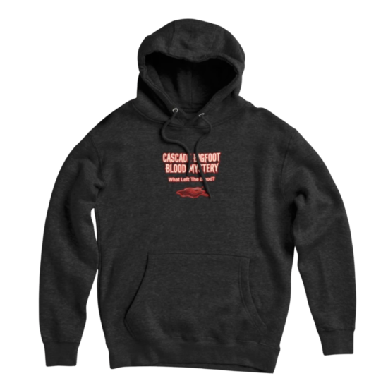 Dark gray pullover hoodie with Cascade Bigfoot Blood Mystery "What Left The Blood?" horror design in red
