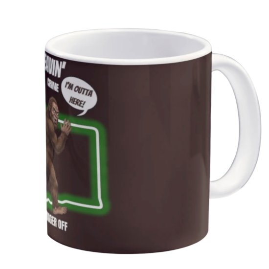 Dark coffee mug with “I Be Leavin’ Taxes Crime Democrats” Bigfoot waving goodbye to the PNW design.