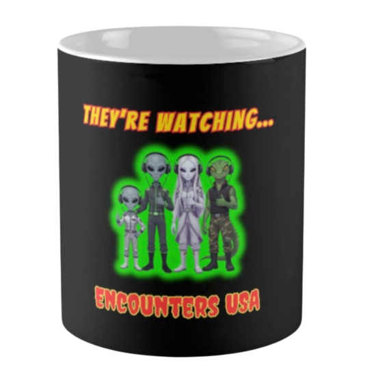 They're Watching funny grey alien pointing design on black ceramic coffee mug - official Encounters USA merch