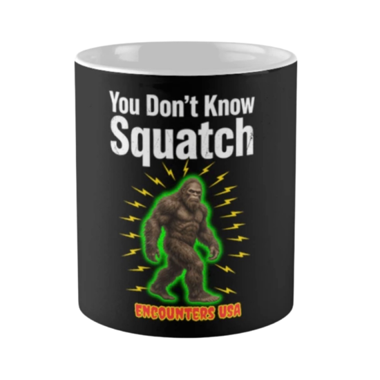 You Don't Know Squatch electric glowing green Bigfoot with lightning bolts on black ceramic coffee mug - official Encounters USA merch